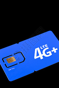 标准卡 微型卡和纳米SIM卡 黑背景堆积电话的SIM卡图片