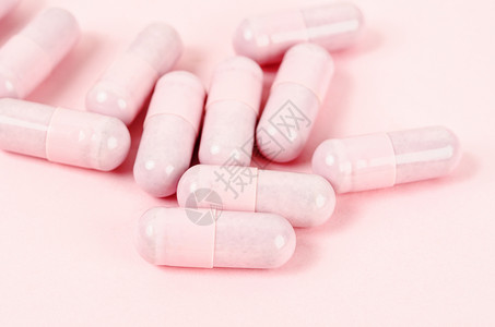 粉红背景粉粉胶片药丸处方药物条件医学行业药店止痛药抗生素消毒副作用图片