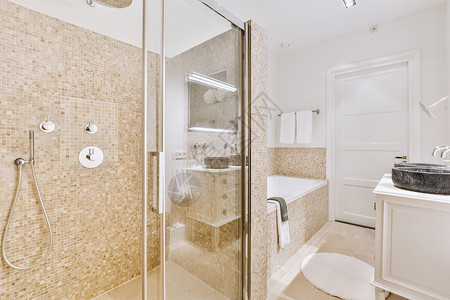 浴缸元素在一个现代舒适的房子里的浴室财产装饰架子大理石材料卫生间毛巾住宅风格卫生背景