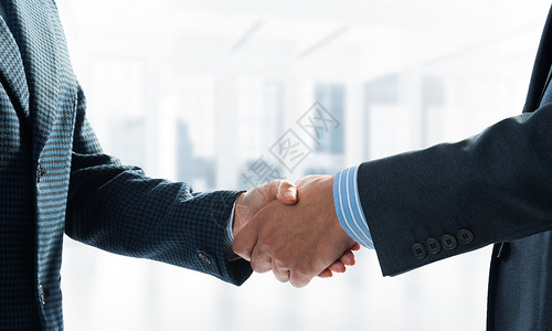 近距离接近商务人士的握手公司交易女性合作团队伙伴合伙协议问候语友谊图片