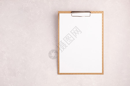 促销列表马龙剪贴板 上面有一张空白纸 他点亮粉红背景背景