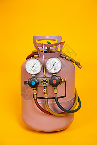 电陶炉用于再加油空调 传感器的压力量计测量装置 黄底带纤维的气瓶 HVAC 工具(HVAC)背景