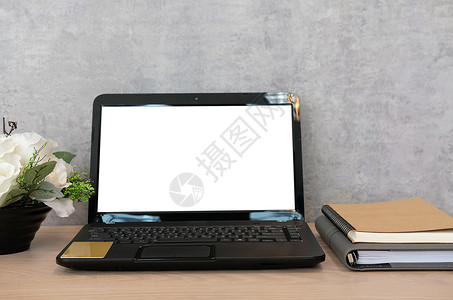 办公室办公桌上的电脑笔记本花 业务工作区花盆笔记本日记教育技术桌子职场背景图片
