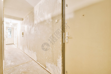 现代公寓的长走廊风格控制板天花板闪电压板通道辉光木地板地面日光图片