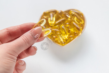处个对象Omega 3号胶囊 鱼脂肪 自然 有选择的焦点药店药片金子鳕鱼食物药物制药治疗凝胶营养背景