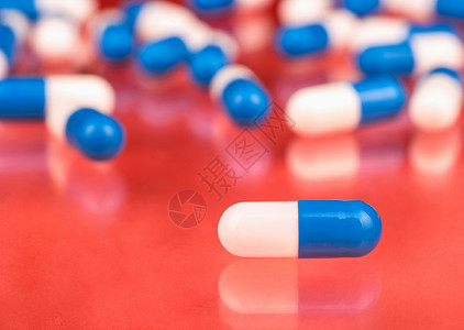 白色蓝胶囊保健处方桃色宏观蓝色止痛药药店药品疾病医疗图片
