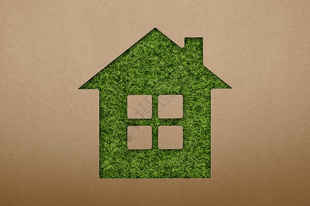 绿色生态住宅标志 绿草房子符号 在纸张纹理背景上 生态能源和节能理念 可再生能源的日益普及财产力量商业技术建筑节约叶子活力植物来背景图片