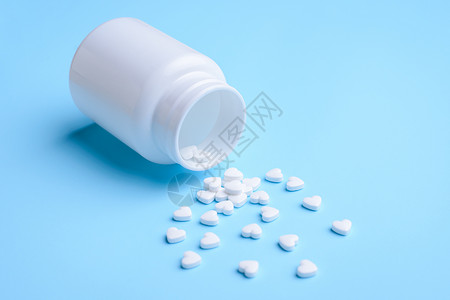 心脏形状的药丸药品药理饮食治愈抗生素蓝色勃起科学药剂力量图片