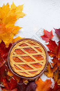 美国秋叶秋叶和馅饼 疯狂的氛围 秋季文章 印刷品秋季厨房脆皮叶子壁球季节假期面包食物桌子传统背景