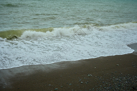 风雨如磐海岩自然的泡沫高清图片