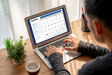 网页列表计算机软件应用日历 用于Modish计划时间表规划桌子社区笔记本规划师药片团队电脑活动男人人士背景