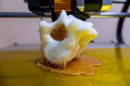 原型图素材现代 3D 打印机打印图特写宏 3d 打印机打印椎骨背景