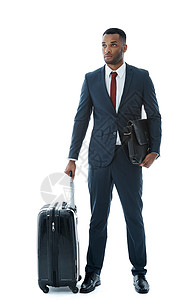 一位英俊的非洲年轻商务人士站在手提箱旁边 却被白绑着孤立在身旁 (美国作家)背景