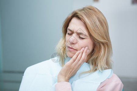 牙科诊所的孕妇牙齿止痛药卫生女士痛苦保健药品病人疼痛空腔图片