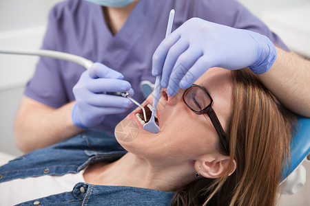 与病人有预约的专业牙医专业牙科医生人数考试治疗女士保健诊所医疗男人口腔科卫生职业背景图片