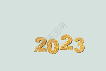 数字 2023 金色亮点是未来新年的象征 顶视图 复制空间背景图片