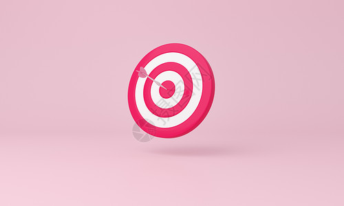 达特在粉红色背景上击中目标中心 商业目标是目标概念 (指向目标)图片