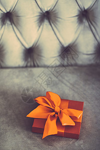 橙色礼物盒子美容礼品晋升高清图片