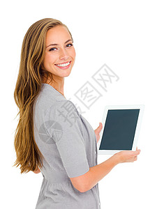 求带上我素材我方便的探险家 工作室肖像画 一个有魅力的年轻女子拿着数字平板电脑背景