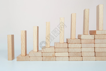 木块拼合图形可持续增长和盈利的企业管理理念背景