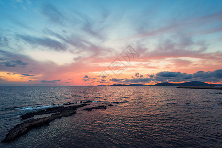 毛尔盖阿尔盖罗湾多彩的日落观光假期橙子旅行太阳场景海洋地平线旅游天空背景