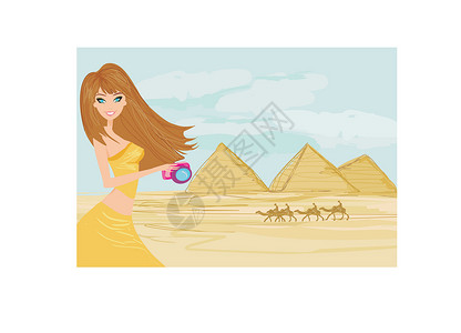 埃及胡夫金字塔在为法老建造的吉萨拍摄照片的自然摄影师城市沙漠建筑学监护人游客蓝色纪念碑爬坡女性吸引力设计图片