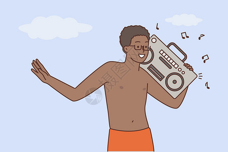 快乐的黑人在立体音响上享受音乐设计图片