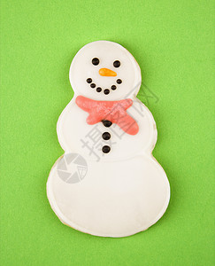 雪人饼干 圣诞饼干 单一对象 糖饼干 可口的 季节性的 圣诞节背景图片