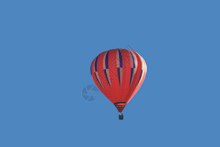 红色条纹热气球热气球 安静的 新墨西哥 红色的 飞行 天空 自由的背景