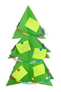 单独的纸板圣诞树 装饰着文具背景图片