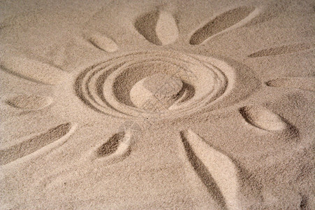沙子上晒太阳 假期 晴天背景图片