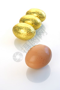 复活鸡蛋 宗教 棒棒糖 巧克力 篮子背景图片