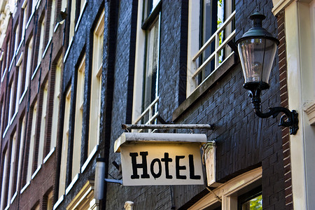酒店旅馆标志 华丽的 老的 镇 城市 服务 墙背景图片