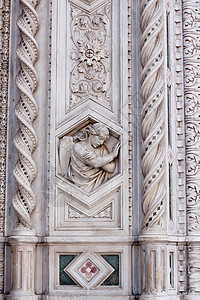 镂空菱形底纹一个天使 螺旋 雕塑 基督教 菱形 户外的 柱子 装饰品背景