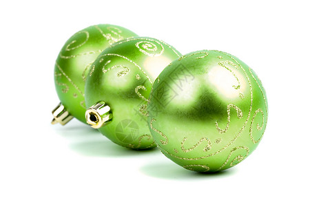 三个绿色圣诞球 闪亮的 玻璃 金的 假期 绿色的 充满活力的背景图片