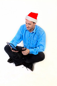 圣诞礼物 电子阅读 当代的 假期 电子书 圣诞老人 展示 教育背景图片