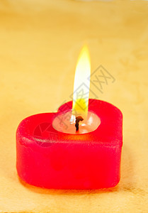 燃烧的心形蜡烛 发光的 烛光 庆典背景图片