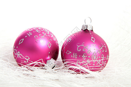两个粉红圆球 火花 季节 庆典 白色的 十二月背景图片