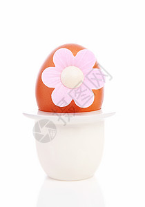 一个鸡蛋 夹着粉红花的鸡蛋背景图片