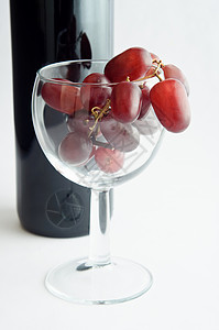 葡萄酒玻璃红葡萄背景图片