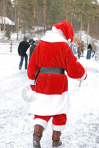 斯堪的纳维亚人 男人 正玩得开心 圣诞老人 快乐的 女孩 礼物 微笑背景图片