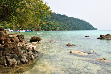 泰国的素林岛国家公园 海浪 反射 太阳 浪漫的 钓鱼图片