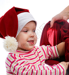 快乐的宝贝 美丽的 惊喜 红色的 孩子 假期 礼物 纯真 乐趣背景图片