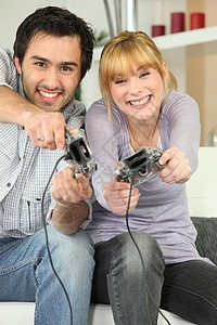 游戏动画素材一对夫妇玩电子游戏 车削 车 假期 家 金发女郎 男人背景