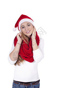 带着红围巾和圣诞帽的年轻美女 织物 女性 时尚图片
