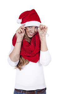 带着红围巾和圣诞帽的年轻美女 女孩 乐趣 美丽的背景图片