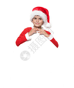 带着圣诞海报的男孩 标语牌 抓住 套装 可爱的 快乐背景图片