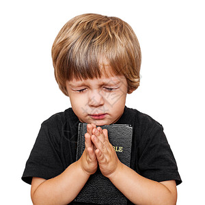 小男孩祈祷传福音者高清图片