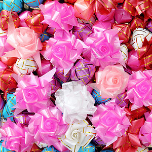 礼品丝带和鲜花的背景颜色 礼物 派对 包装 惊喜背景图片