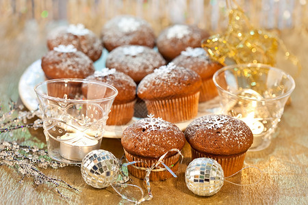 圣诞风杯子蛋糕圣诞松饼 食物 金子 传统 假期 家 蛋糕 结霜背景
